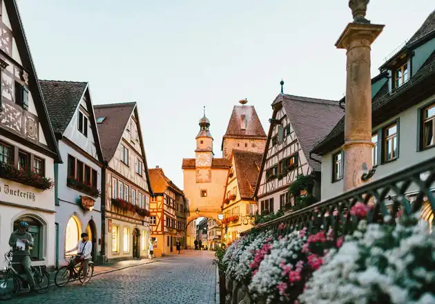 River cruise ship docked in a historic European town — all European river cruises